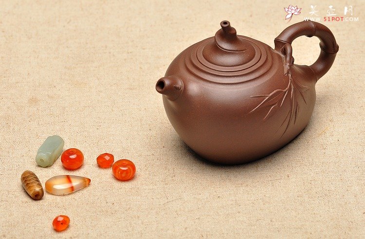 紫砂壶图片：90年代初 仿品 葫芦竹 正宗黑星土 - 美壶网