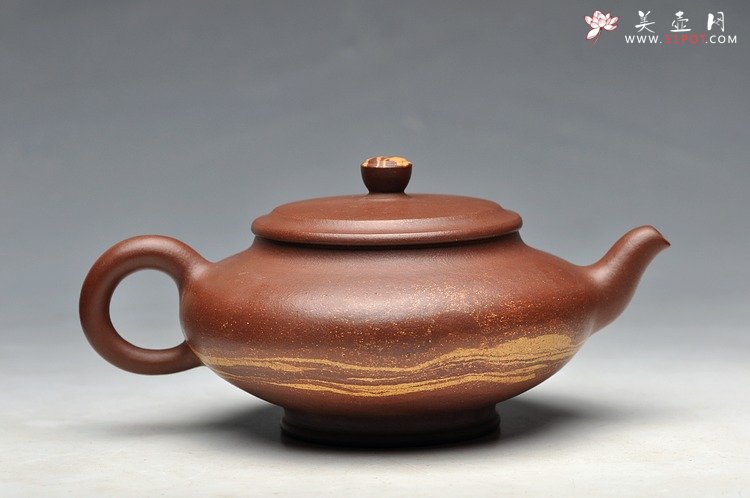 紫砂壶图片：俊秀神怡 通透绞泥加铺砂 全手笑云 - 美壶网