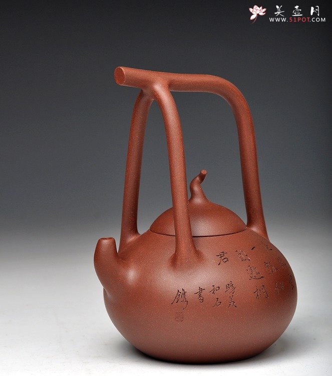 紫砂壶图片：国助工强强联合 和石装饰 传统经典 全手瓢提梁 - 美壶网