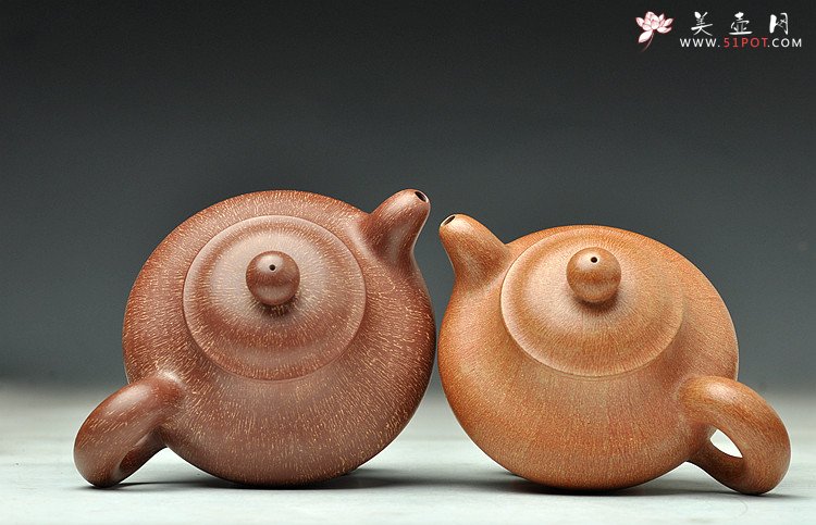 紫砂壶图片：蓄势内敛 趣味盎然 全手婉珠 创新技法表现 非常有味道~  紫泥和段泥两种 - 美壶网