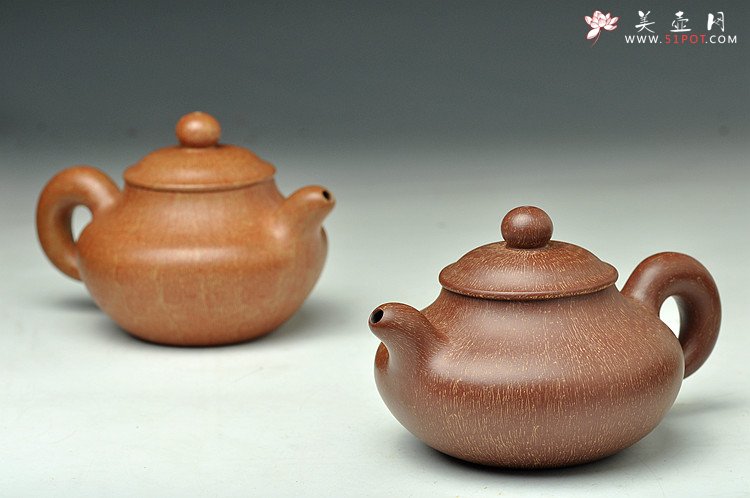 紫砂壶图片：蓄势内敛 趣味盎然 全手婉珠 创新技法表现 非常有味道~  紫泥和段泥两种 - 美壶网