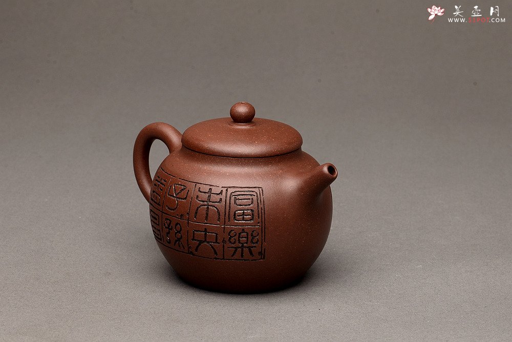 紫砂壶图片：端庄秀雅 双刀禅意装饰 全手和悦 适宜普洱、红茶 - 美壶网