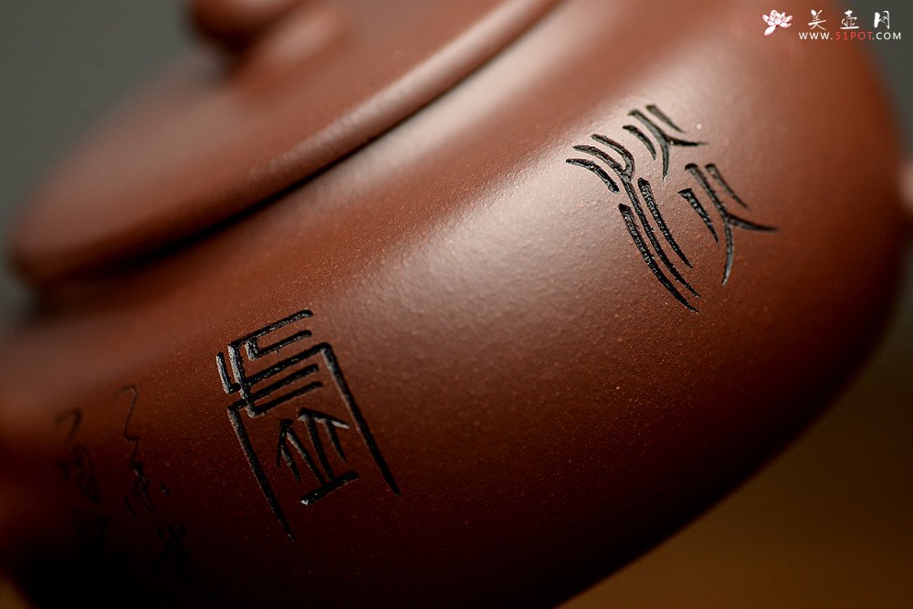 紫砂壶图片：实用佳器 秀气可爱 扁拙 - 美壶网