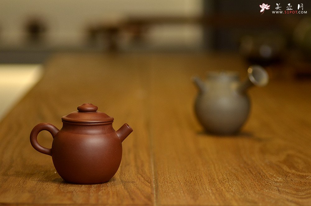 紫砂壶图片：美壶特惠 玩味巨轮 茶人最爱 实用 独孔加不锈钢滤网 - 美壶网