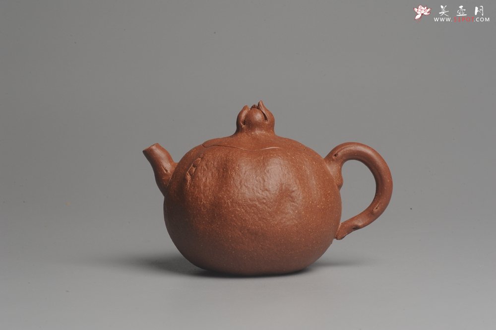 紫砂壶图片：美壶特惠 油润降坡泥精致卡盖全手工仿生石榴壶 - 美壶网