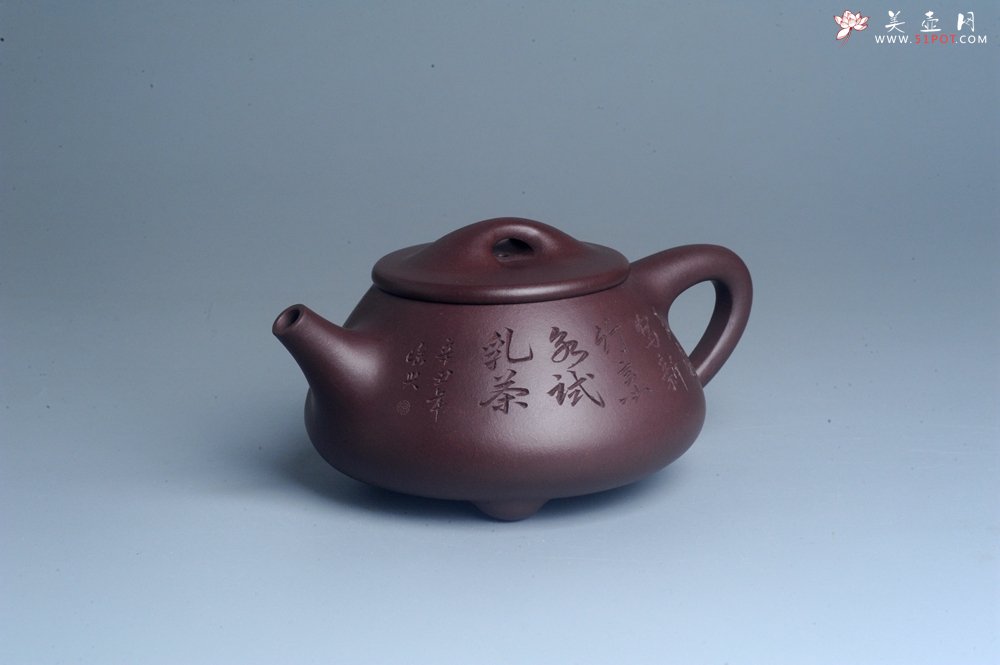 紫砂壶图片：实力派工艺师周斌 优质底槽青全手工精工满瓢壶 陶兴双刀装饰 特文气 玉壶写新竹 烹泉试乳茶 - 美壶网