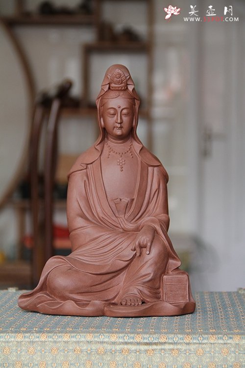 紫砂壶图片：持经观音 - 美壶网